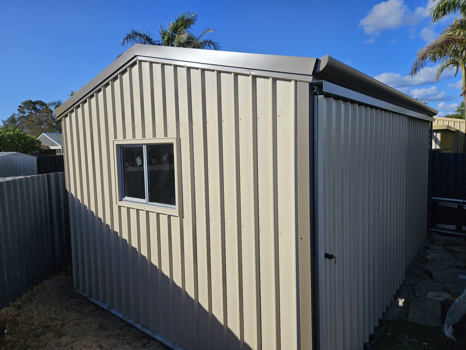 Domestic shed installation Perth — skillion roof with window